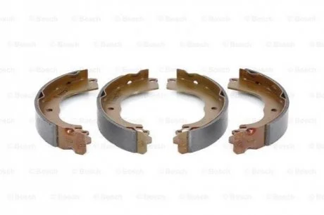 Колодки гальмівні барабанні, комплект для Nissan, Peugeot, Citroen, Mitsubishi BOSCH 0986487799 фото товару