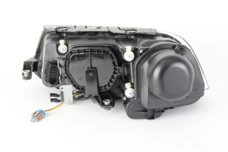 VW Фара основная Bi-Xenon с мотором,без газор.лампы,с лампами накал.D2S/H7 PY21W W5W прав.Passat 00- для HELLA 1EL 008 340-081 фото товару