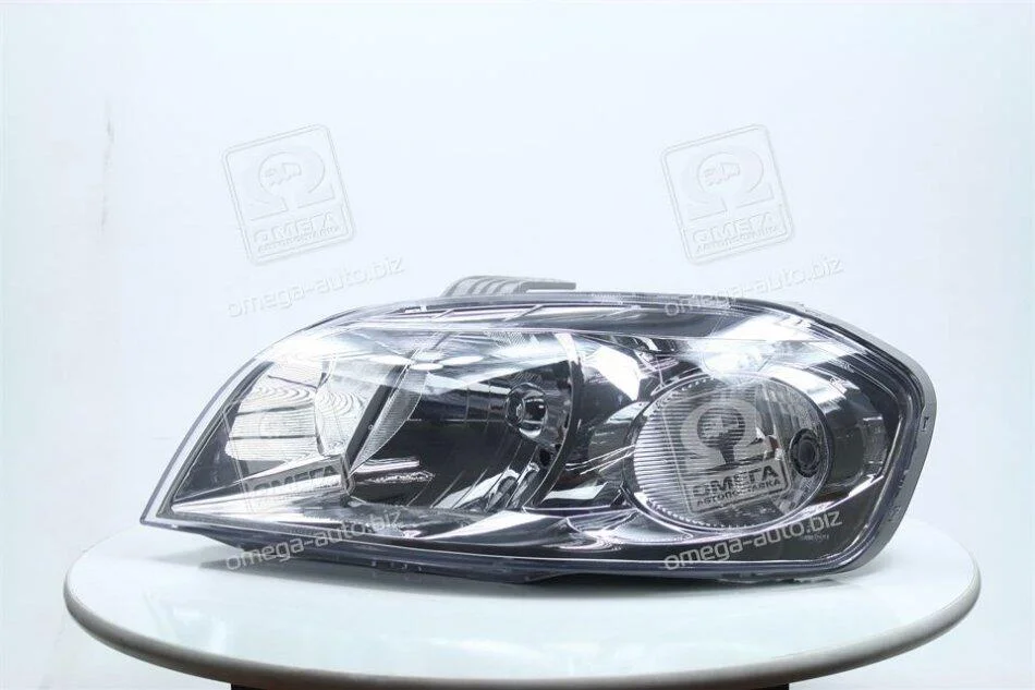 <strong>Фара левая с моторчиком Chevrolet Aveo T250 (06-) седан TYC 20B082A52B (фото 1)</strong>